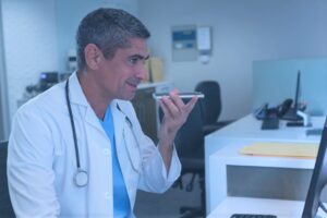 Physician dictating through a mobile speech recognition app